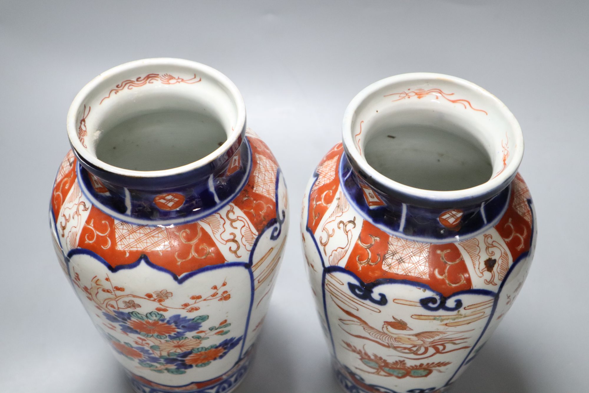 A pair of Meiji period Imari vases, height 23cm